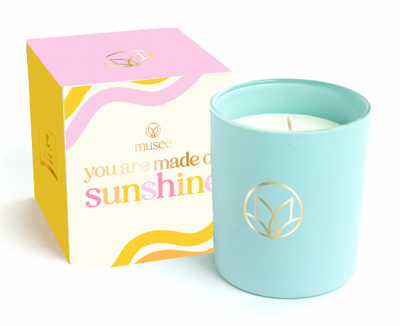 Musee x St. Jude You are Made of Sunshine Candle  Musee  Paper Skyscraper Gift Shop Charlotte