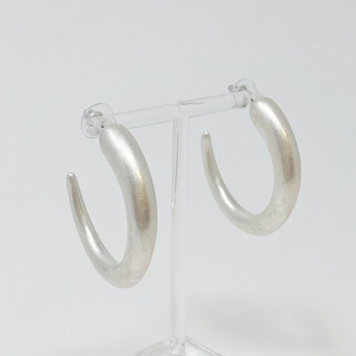 So Smooth Daily Hoop Earrings: Silver  Ellison+Young  Paper Skyscraper Gift Shop Charlotte