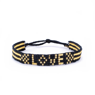 Seed Bead LOVE Bracelet - Black and Gold  Love Is Project  Paper Skyscraper Gift Shop Charlotte